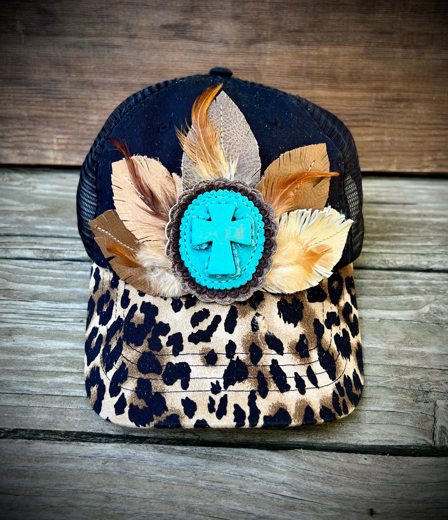 Leather feathers cap