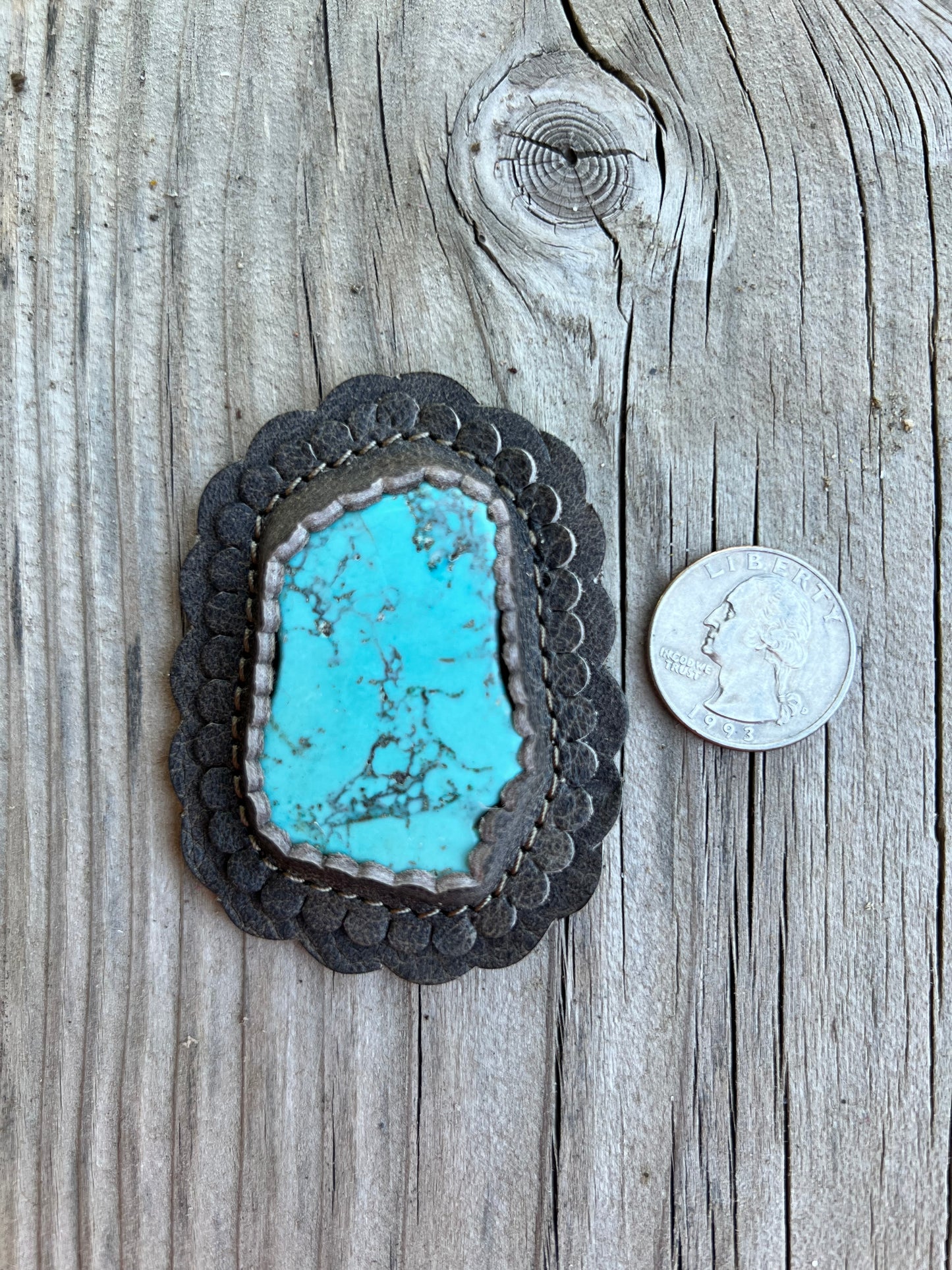 Turquoise cabochon in taupe