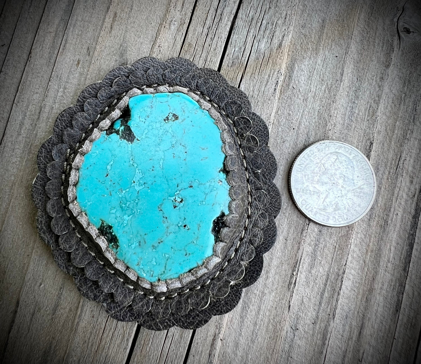 Turquoise cabochons in granite