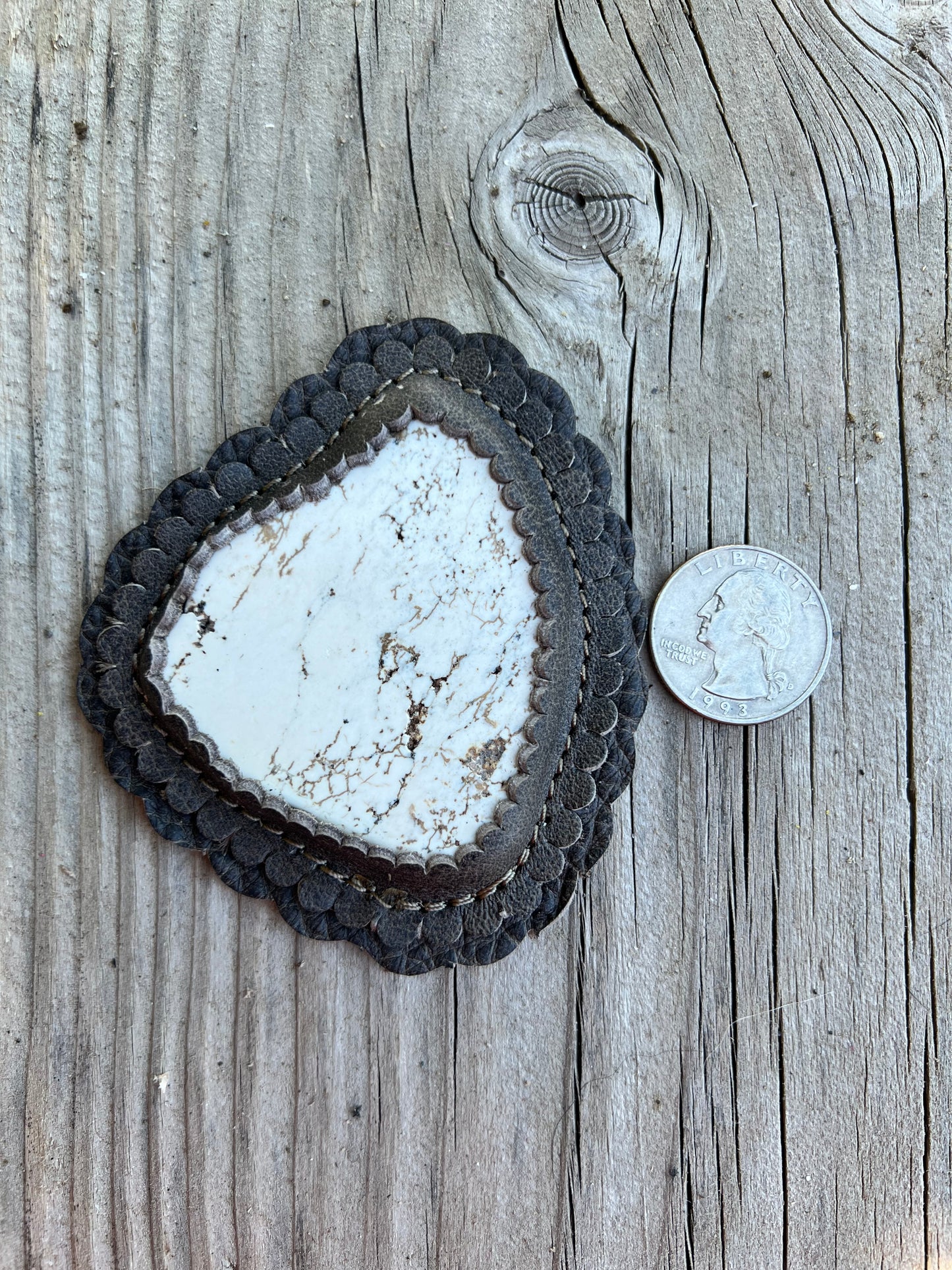 White magnesite cabochon