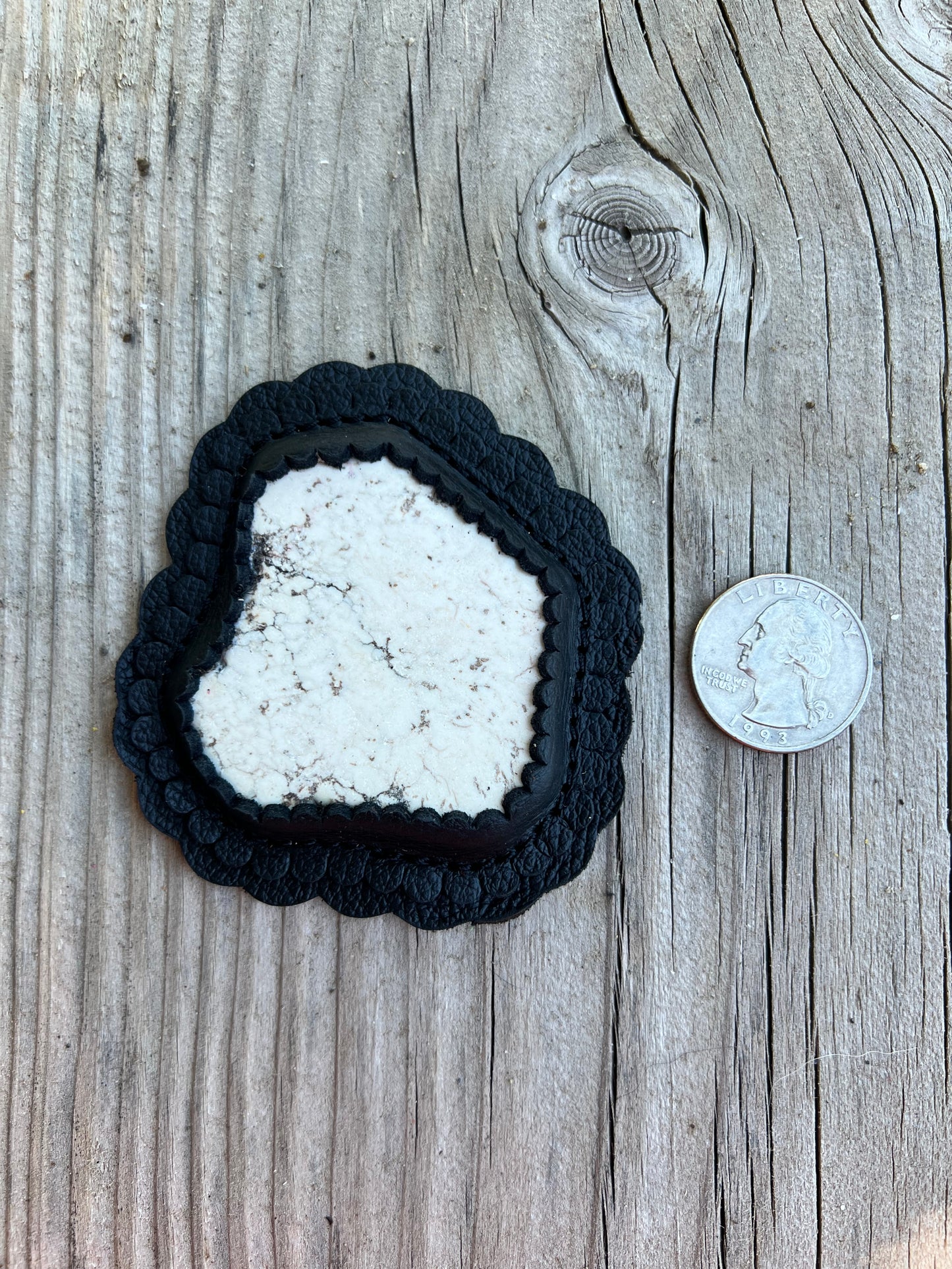 White magnesite cabochon
