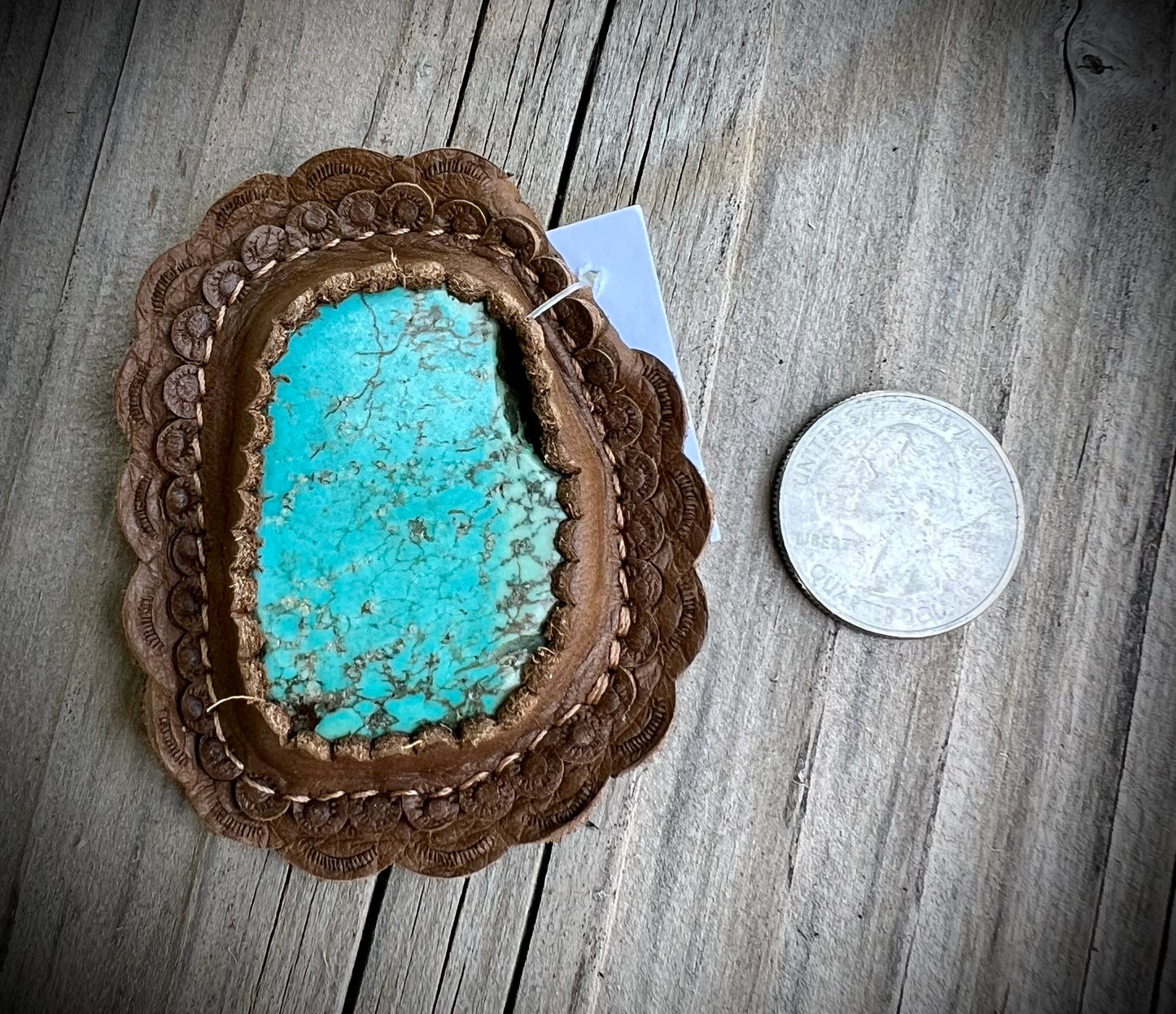 Turquoise cabochons in brown