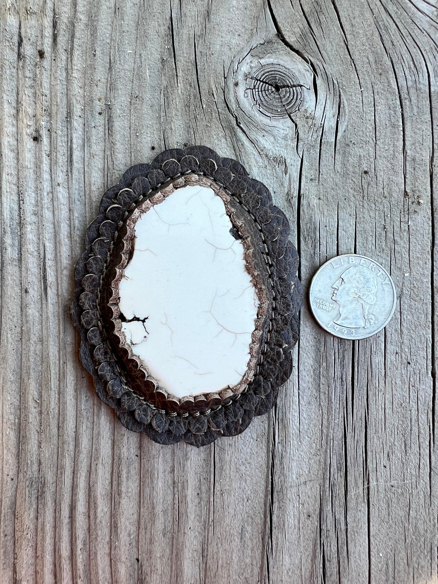 White magnesite cabochon