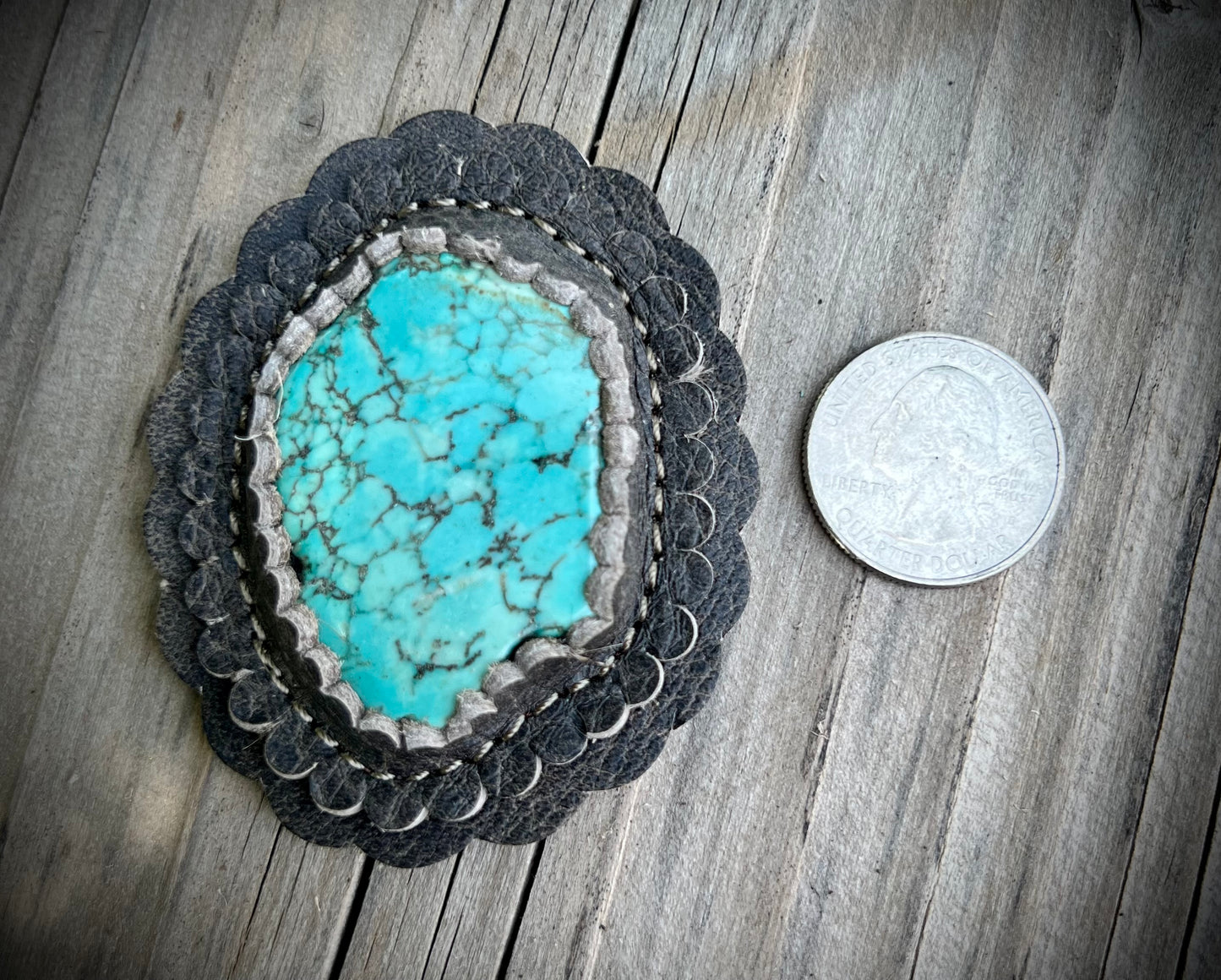 Turquoise cabochons in granite