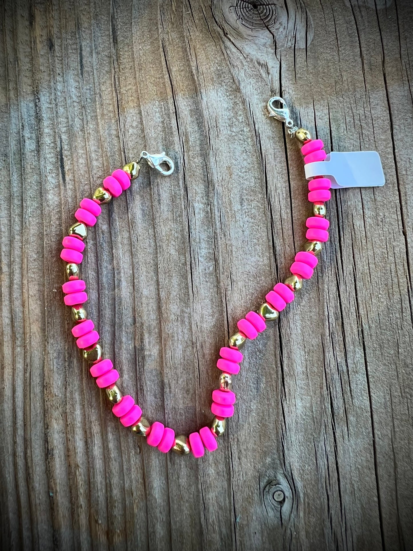 Hot pink with gold hat bling