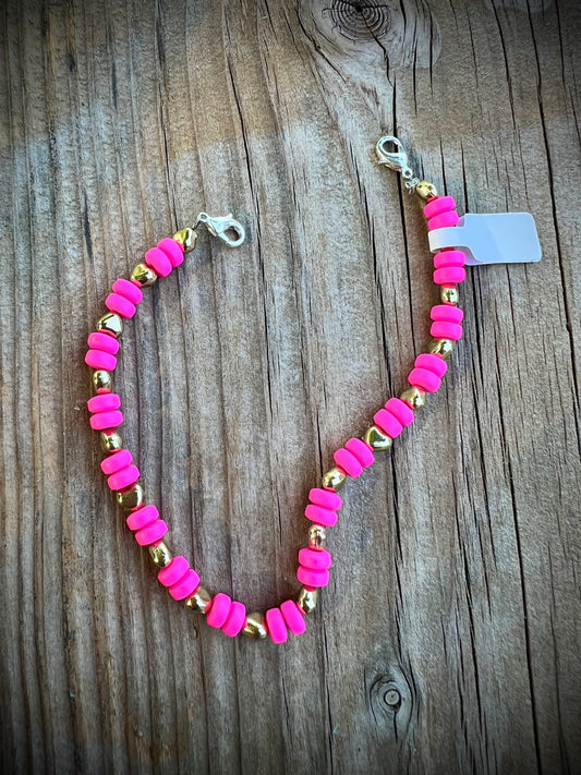 Hot pink with gold hat bling