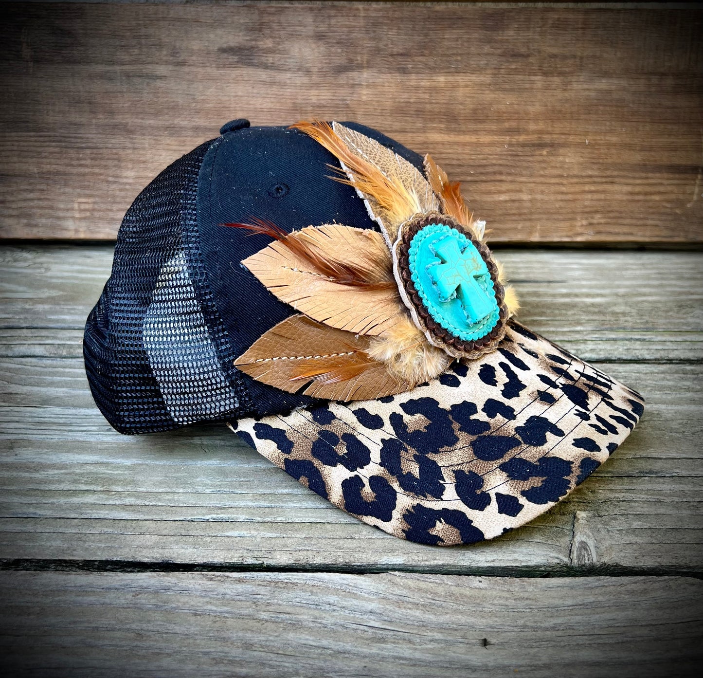 Leather feathers cap