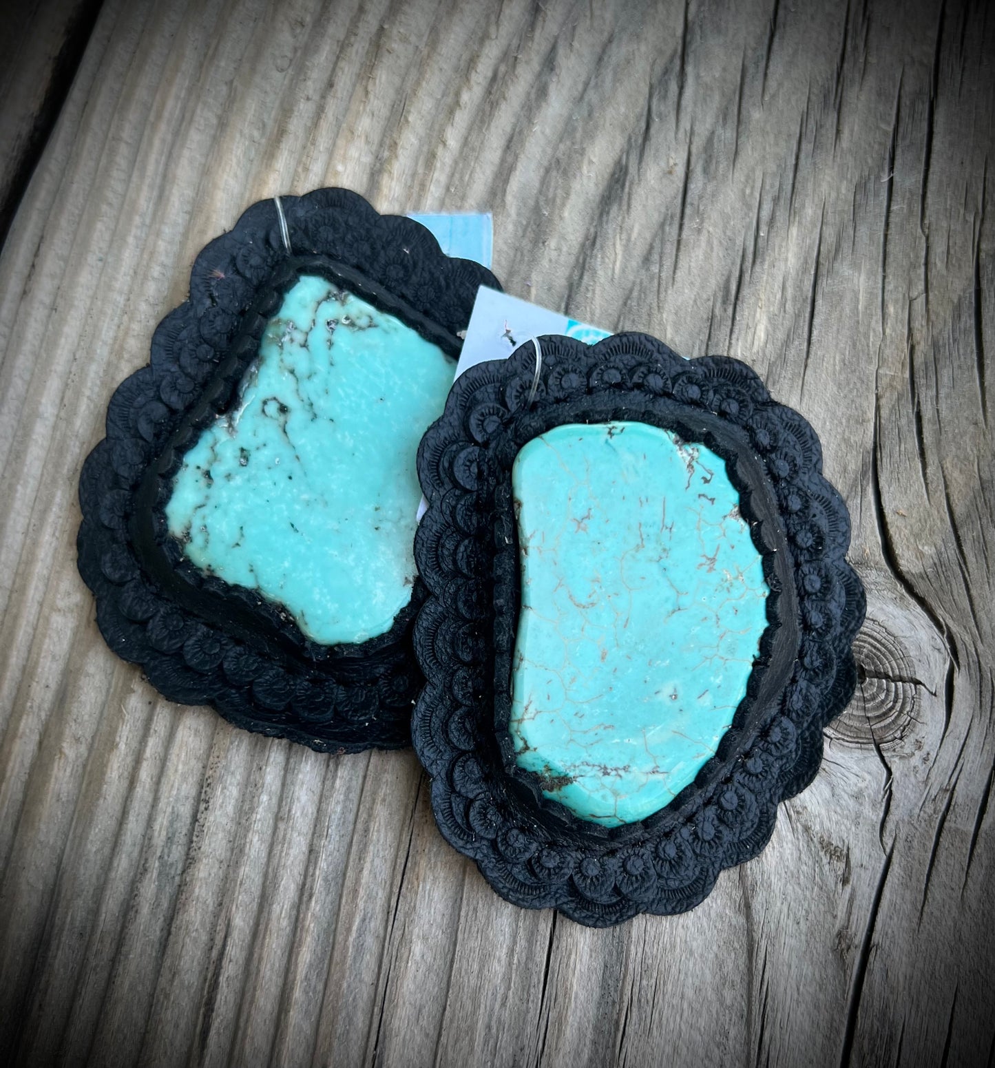 Turquoise in black leather