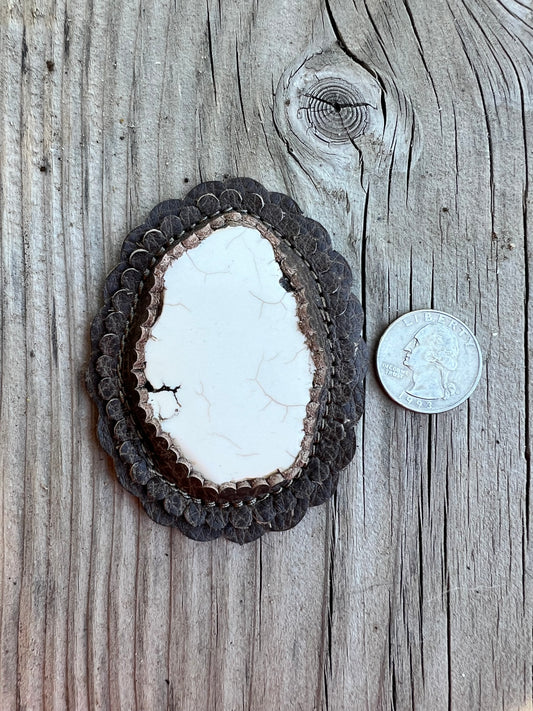 White magnesite cabochon