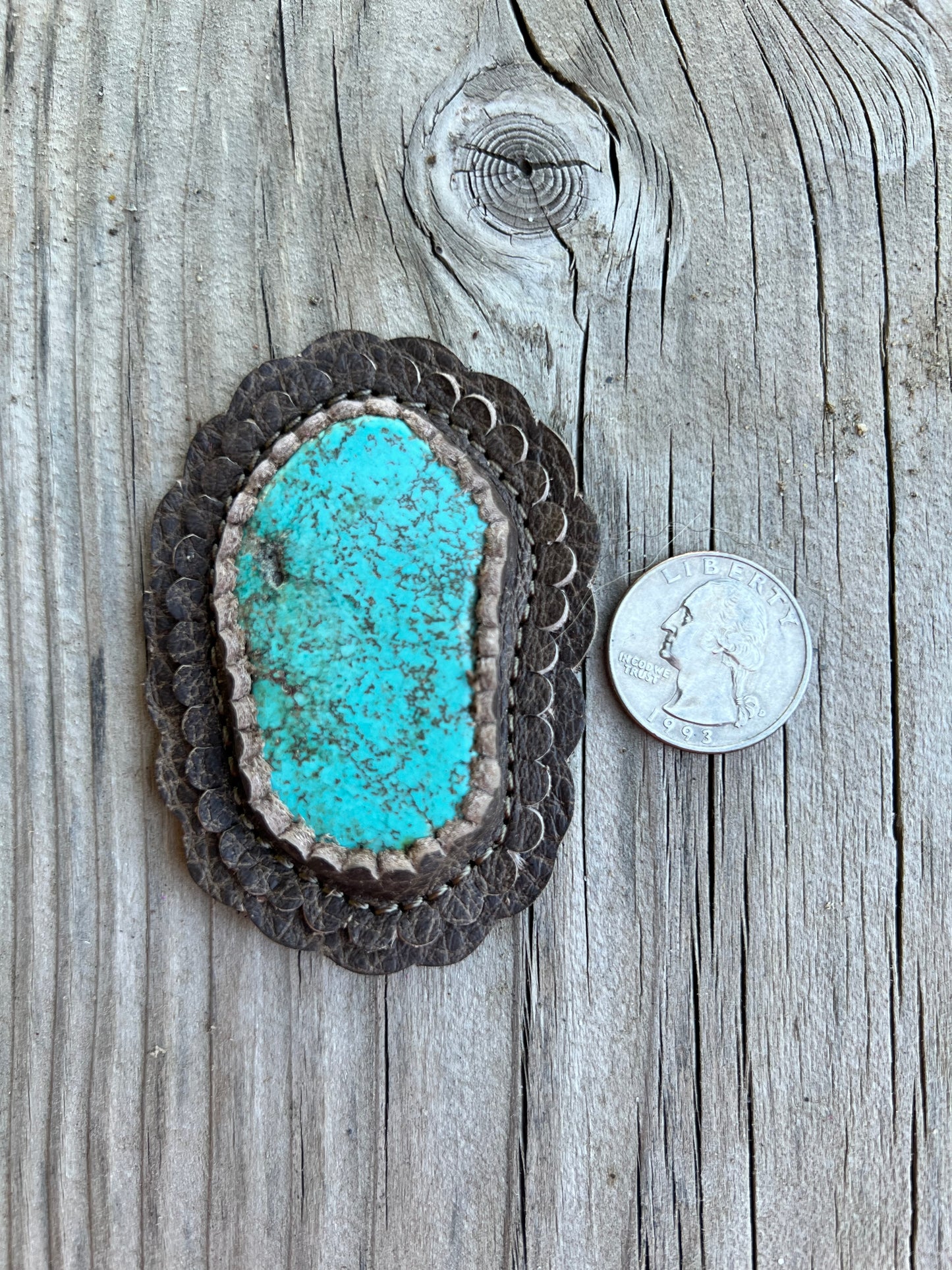 Turquoise cabochon in taupe