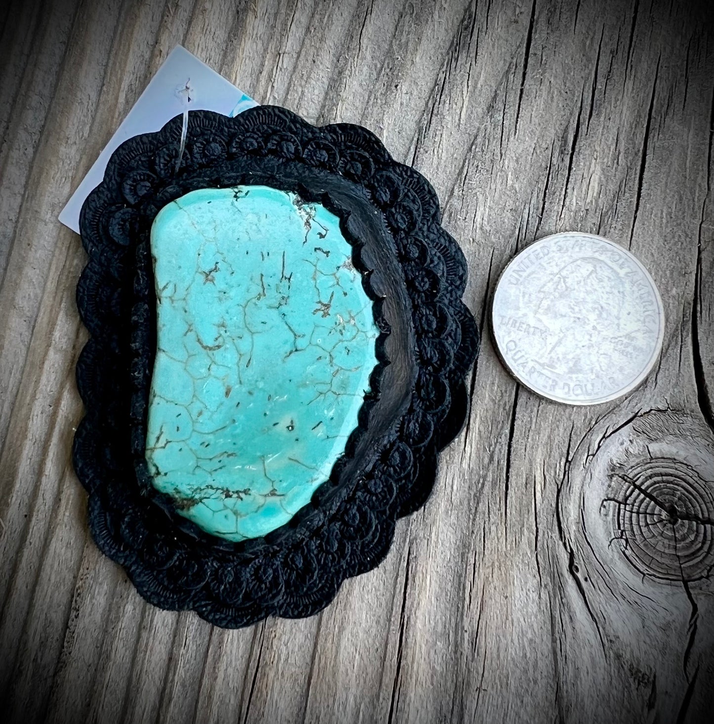 Turquoise in black leather