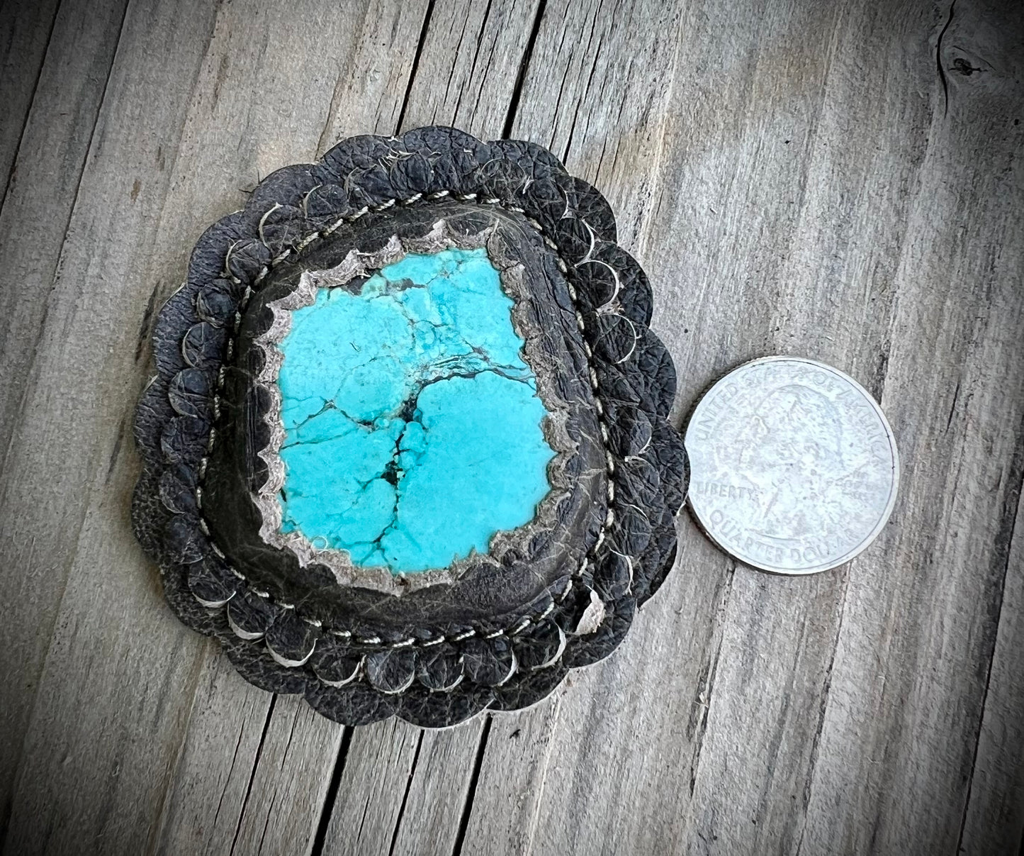 Turquoise cabochons in granite