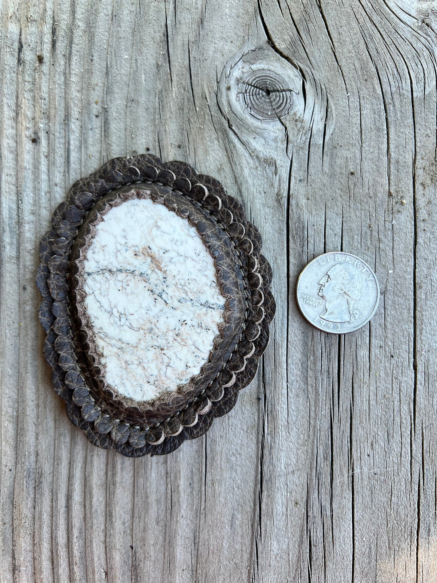 White magnesite cabochon