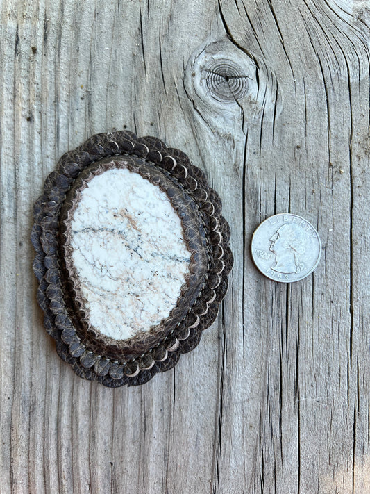 White magnesite cabochon